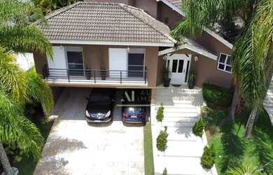 Imagem: A casa em condomínio possui 4 Dormitórios, 5 Banheiros, 5