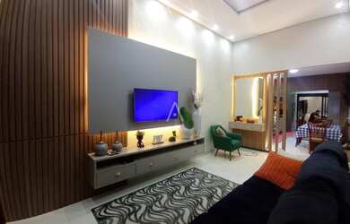 Imagem: A casa possui 3 Dormitórios, 2 Banheiros, 2 Vagas na garagem