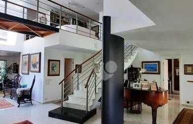 Imagem: A casa em condomínio possui 5 Dormitórios, 5 Banheiros, 5