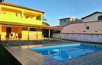 Imagem: A casa possui 4 Dormitórios, 3 Banheiros, 5 Vagas na garagem