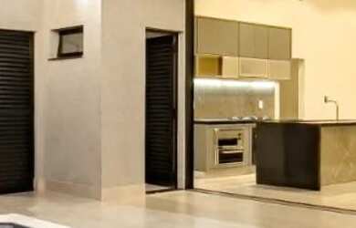 Imagem: A casa em condomínio e possui 3 Dormitórios, 3 Banheiros