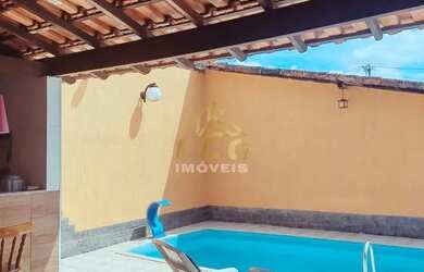 Imagem: A casa possui 4 Dormitórios, 4 Banheiros, 5 Vagas na garagem