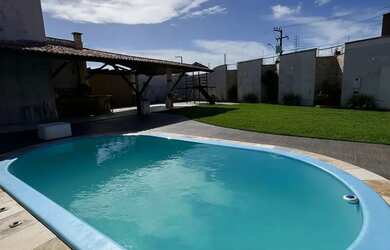 Imagem: A casa em condomínio possui 3 Dormitórios, 2 Banheiros, 2