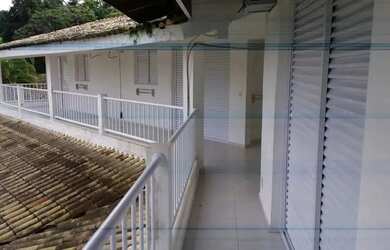 Imagem: A casa possui 5 Dormitórios, 5 Banheiros, 5 Vagas na garagem