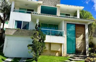 Imagem: A casa em condomínio possui 4 Dormitórios, 5 Banheiros, 4