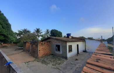 Imagem: A casa possui 2 Dormitórios, 1 Banheiro, 3 Vagas na garagem