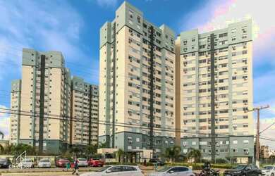 Imagem: O apartamento possui 2 Dormitórios, 1 Banheiro, 1 Vaga na garagem