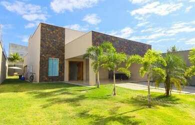 Imagem: A casa possui 3 Dormitórios, 4 Banheiros, 4 Vagas na garagem