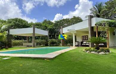 Imagem: A casa possui 2 Dormitórios, 2 Banheiros, 5 Vagas na garagem