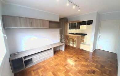 Imagem: O apartamento possui 1 Dormitório, 1 Banheiro, 1 Vaga na garagem