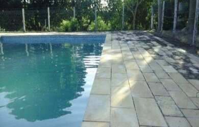 Imagem: A casa possui 2 Dormitórios, 1 Banheiro, 1 Vaga na garagem