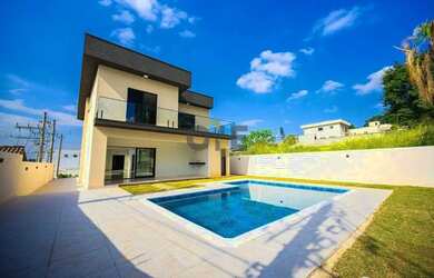 Imagem: A casa em condomínio possui 4 Dormitórios, 5 Banheiros, 4