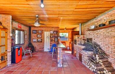 Imagem 12: Casa em Hípica. Piscina, Churrasqueira, VarandaeGuarda roupa