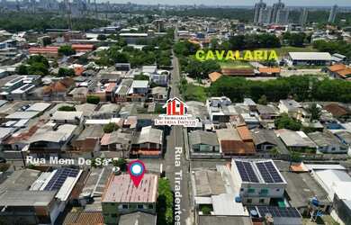 Imagem 4: Casa de Esquina no Dom Pedro 1 - Casa de esquina com um prédio