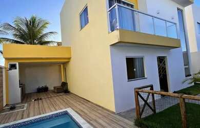 Imagem: A casa possui 3 Dormitórios, 4 Banheiros, 5 Vagas na garagem