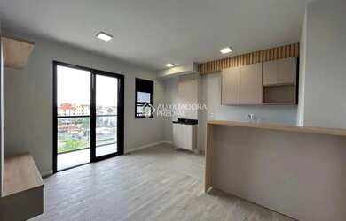 Imagem: O apartamento possui 2 Dormitórios, 1 Banheiro, 1 Vaga na garagem