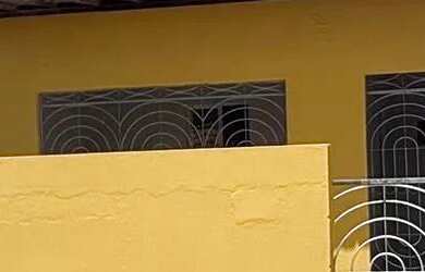 Imagem: A casa possui 2 Dormitórios, Acomodam 12 pessoas, 1 Vaga na