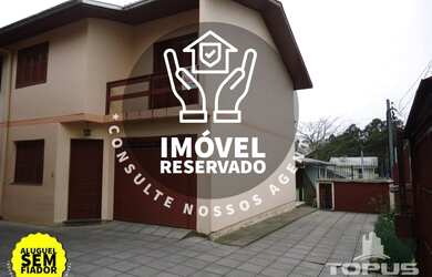 Imagem: A casa possui 3 Dormitórios, 1 Banheiro, 1 Vaga na garagem