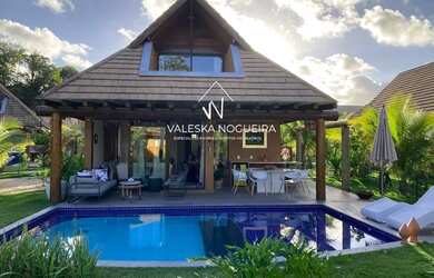 Imagem: A casa possui 3 Dormitórios, 4 Banheiros, 2 Vagas na garagem