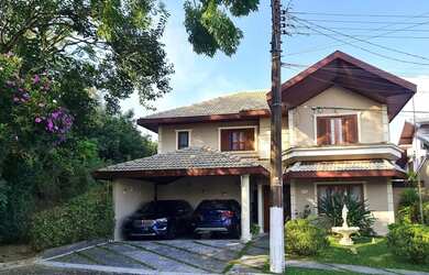 Imagem: A casa possui 5 Dormitórios, 5 Banheiros, 2 Vagas na garagem