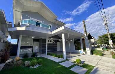 Imagem: A casa em condomínio possui 3 Dormitórios, 4 Banheiros, 4