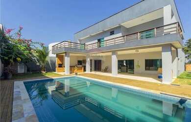 Imagem: A casa em condomínio possui 5 Dormitórios, 5 Banheiros, 4