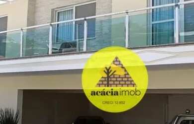 Imagem: A casa possui 4 Dormitórios, 5 Banheiros, 5 Vagas na garagem