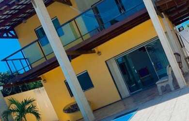 Imagem: A casa à venda possui 3 Dormitórios e 4 Vagas na garagem e