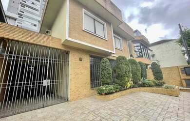 Imagem: A casa possui 5 Dormitórios, 5 Banheiros, 5 Vagas na garagem