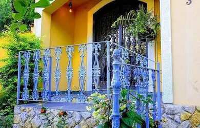 Imagem: A casa possui 5 Dormitórios, 4 Banheiros, 4 Vagas na garagem