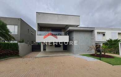 Imagem: A casa em condomínio à venda possui 4 Dormitórios, 5 Banheiros