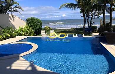 Imagem: A casa possui 5 Dormitórios, 5 Banheiros, 3 Vagas na garagem