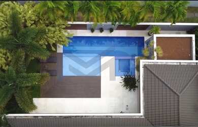 Imagem: A casa em condomínio possui 5 Dormitórios, 5 Banheiros, 4