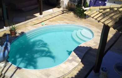 Imagem 9: Casa deslumbrante com 5 quartos, área gourmet, piscina e vista para a...