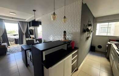 Imagem: O apartamento possui 2 Dormitórios, 1 Banheiro, 1 Vaga na garagem