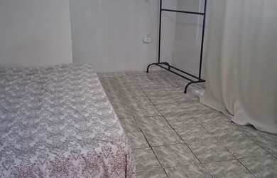 Imagem 2: Aluga-se guarto. 