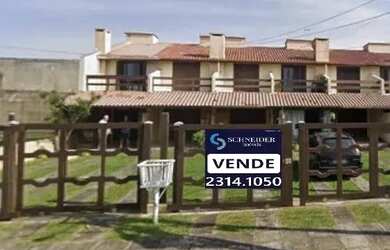 Imagem: A casa possui 2 Dormitórios, 1 Banheiro, 1 Vaga na garagem