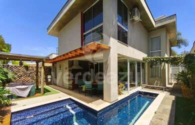 Imagem: A casa em condomínio possui 4 Dormitórios, 5 Banheiros, 4