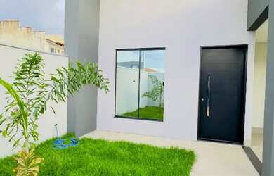 Imagem: A casa possui 3 Dormitórios, 2 Banheiros, 2 Vagas na garagem