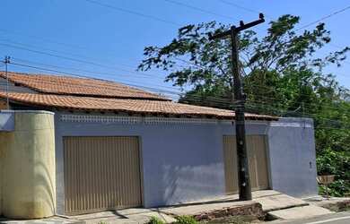 Imagem: A casa possui 5 Dormitórios, 5 Banheiros, 5 Vagas na garagem