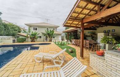 Imagem: A casa em condomínio possui 5 Dormitórios, 5 Banheiros, 5