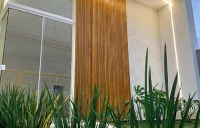 Imagem: A casa possui 3 Dormitórios, 4 Banheiros, 3 Vagas na garagem