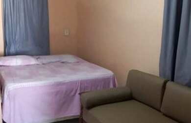 Imagem: A casa possui 2 Dormitórios, 3 Vagas na garagem e está localizado