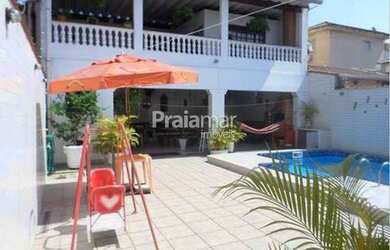 Imagem: A casa possui 3 Dormitórios, 4 Banheiros, 3 Vagas na garagem