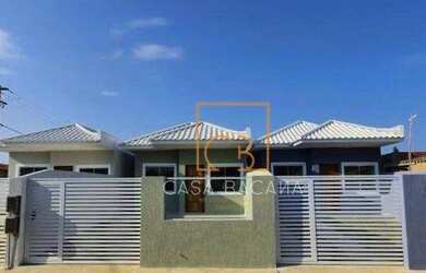 Imagem: A casa possui 3 Dormitórios, 1 Banheiro, 1 Vaga na garagem