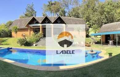 Imagem: A casa em condomínio possui 4 Dormitórios, 5 Banheiros, 5