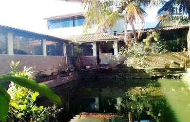 Imagem: A casa possui 3 Dormitórios, 3 Banheiros, 4 Vagas na garagem