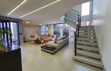 Imagem: A casa em condomínio possui 4 Dormitórios, 5 Banheiros, 2