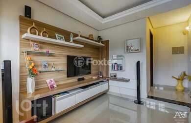 Imagem: A casa possui 3 Dormitórios, 2 Banheiros, 3 Vagas na garagem