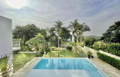 Imagem: A casa em condomínio possui 4 Dormitórios, 5 Banheiros, 5